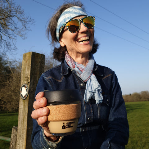 elizabeth furth laughing with coffee cup