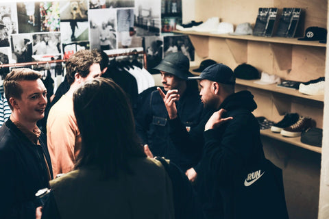 Men gathered at launch party of POP Trading Company