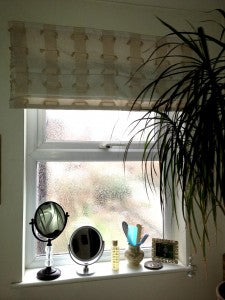 white bathroom roman blind out of window recess