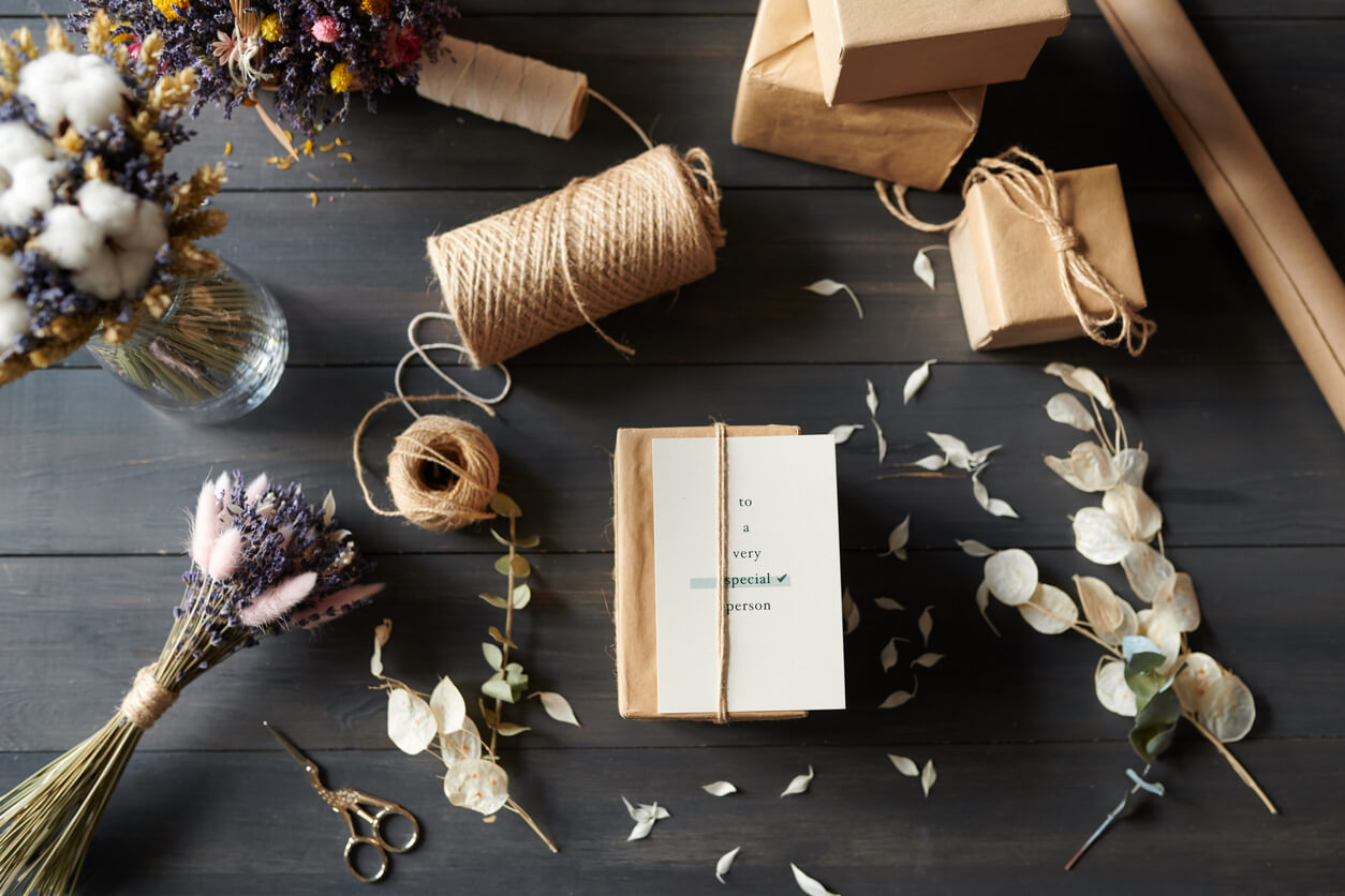 Twine, scissors and other materials needed for pressed flower wedding invitations