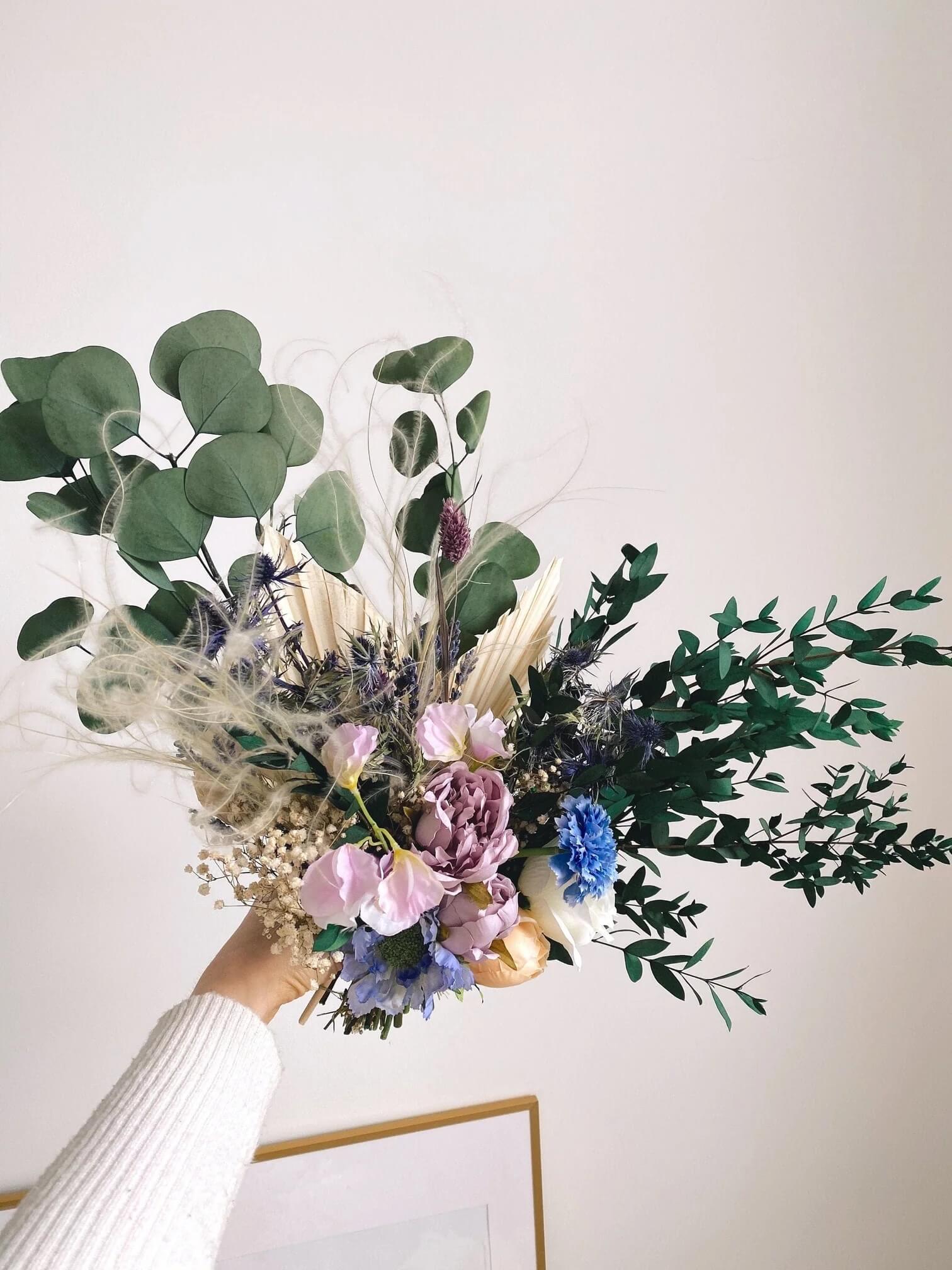 Pastel lilac and dried greenery vintage wedding flowers with sweet peas by Hidden Botanics.