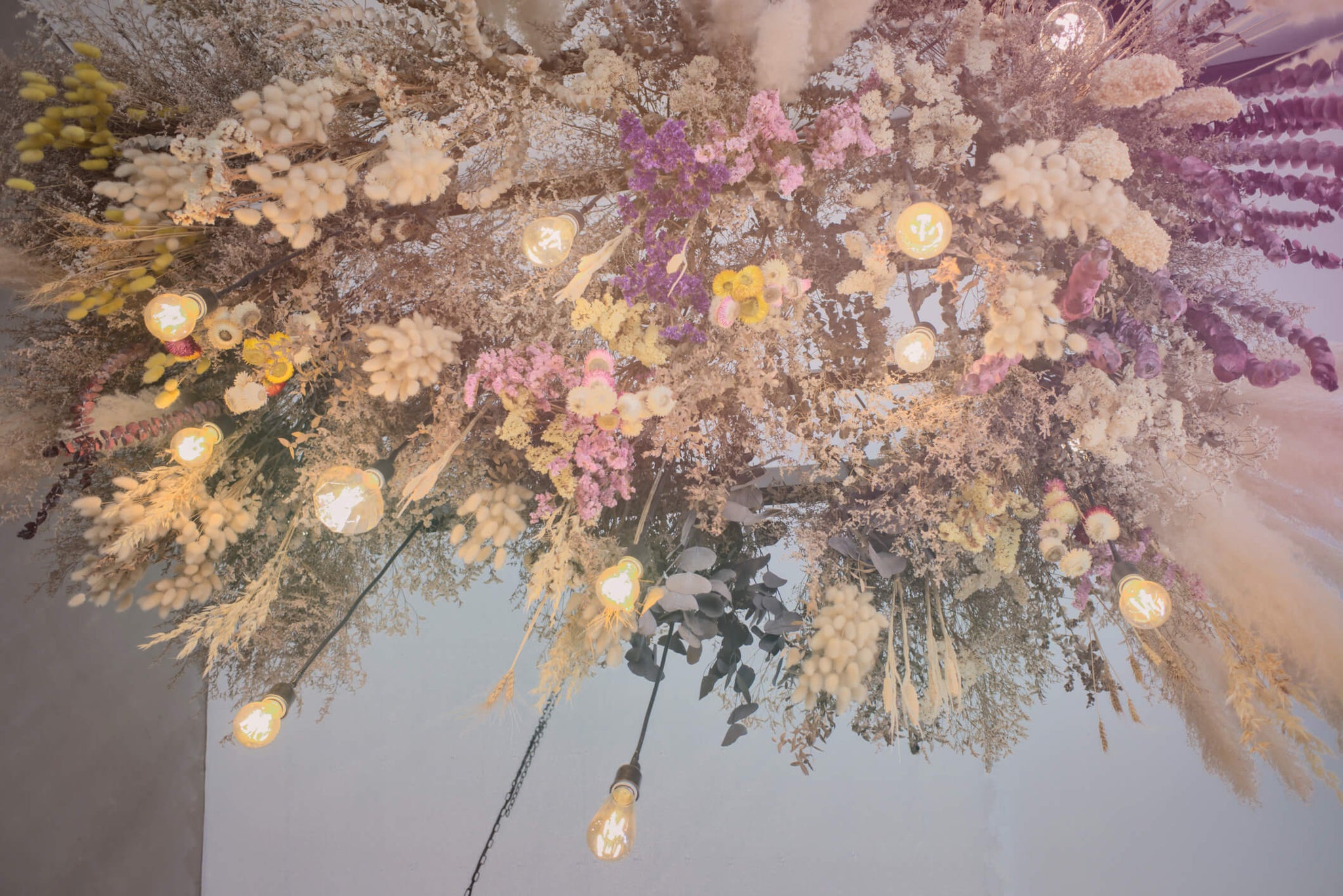 Dried flower chandeliers by Hidden Botanics.