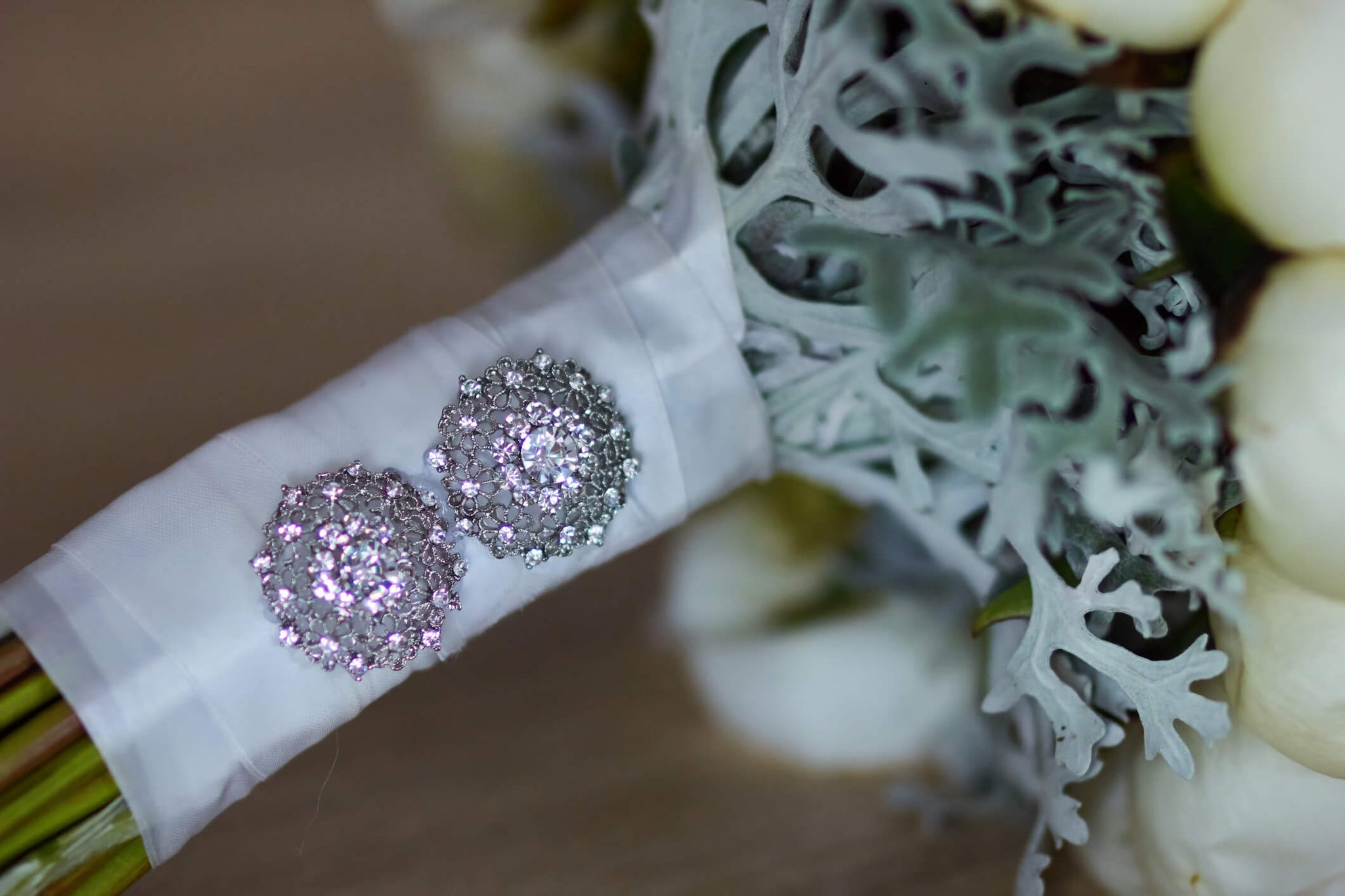 Embellishment added to the binding of the wedding bouquet.