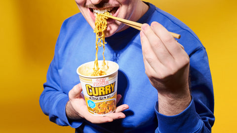 Man enjoying instant ramen