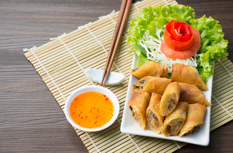 Spring rolls paired with sweet chili sauce