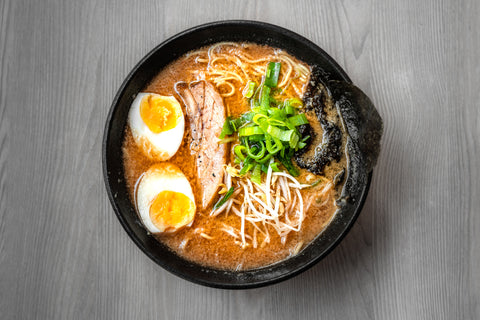 Bowl of ramen with various toppings