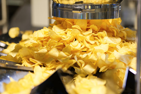 Potato chips being made