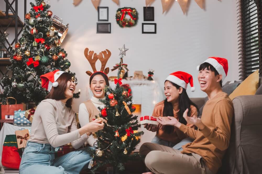 Asian friends celebrating christmas