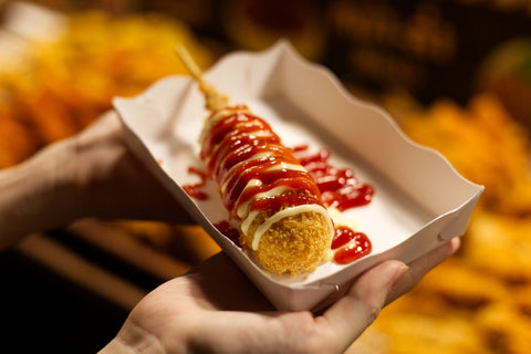 Korean corn dog on a paper plate