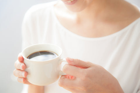 Woman drinking coffee