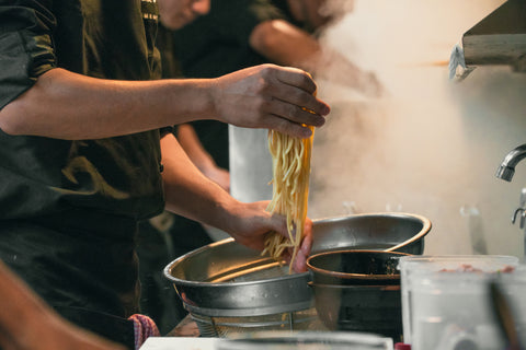 Chef cooking udon