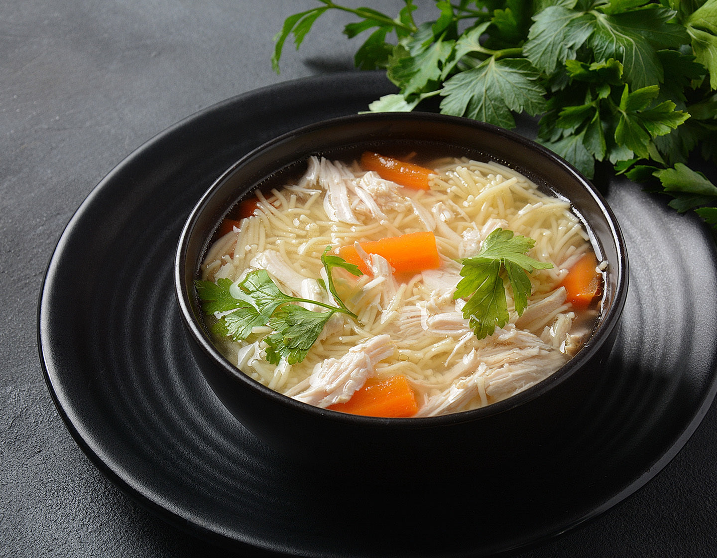 Chicken soup in a bowl made with tea