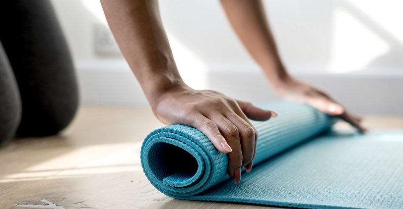 Rolling up a yoga mat