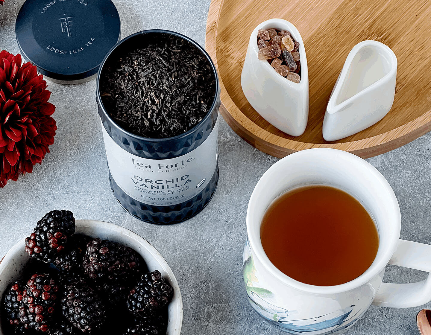 Orchid Vanilla Loose Tea Canister on a breakfast table