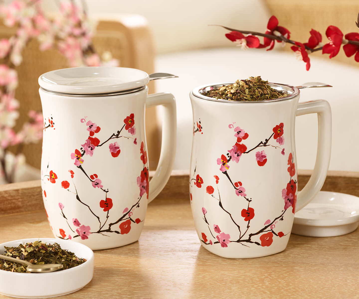 Two Fiore Sakura Steeping Cups & Infuser, one with tea inside