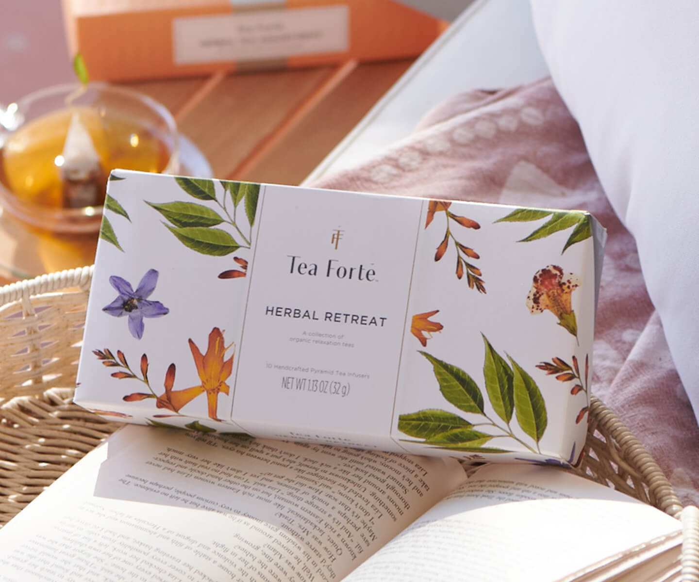 Herbal Retreat tea box with an open book and cup of tea