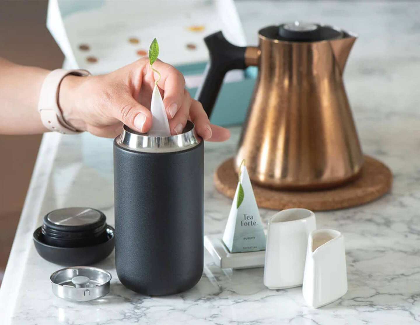 Steeping in a Carter Move travel mug with pyramid infuser
