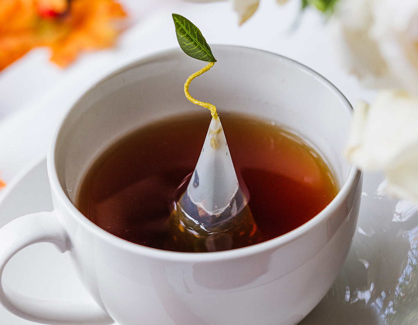 Cup of tea with a pyramid infuser inside