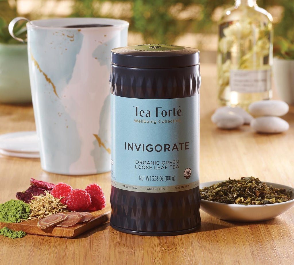 Invigorate loose leaf tea canister with Wellbeing KATI Cup in background