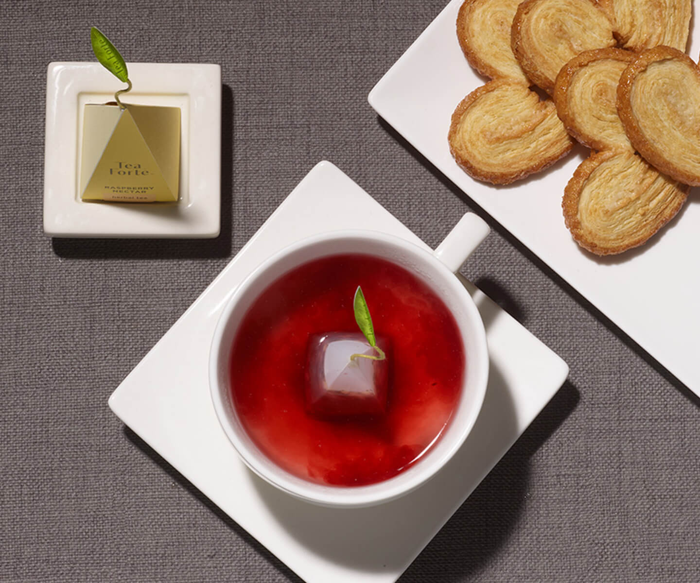 Steeping Raspberry Nectar tea ina white teacup