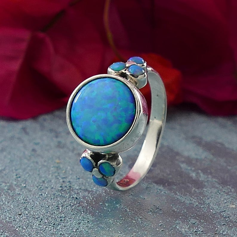 Sølvring med blå Opal sten, 57 (L)