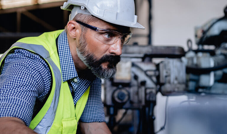 Man Wearing Safety Glasses