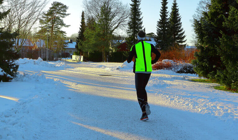 Man Jogging In Reflective Vest