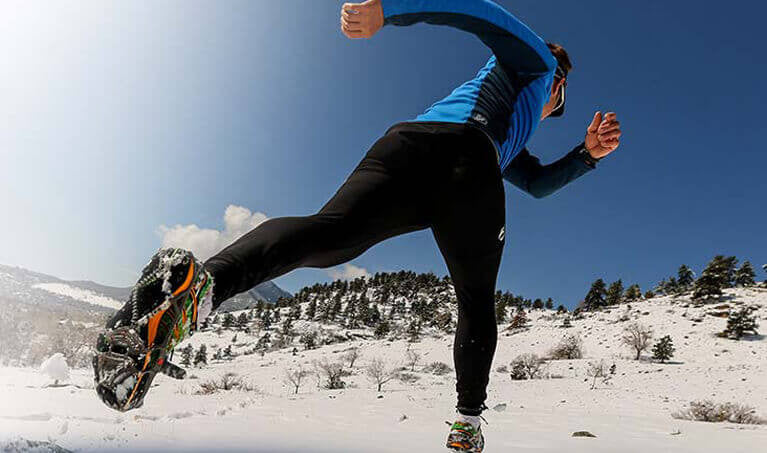 Man Running In YakTrax