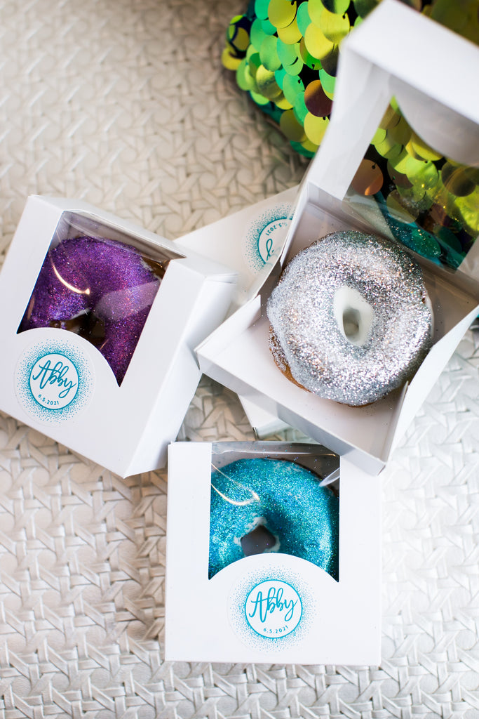 Custom to-go box for glitter doughnuts with branding at a mitzvah in Austin, Texas