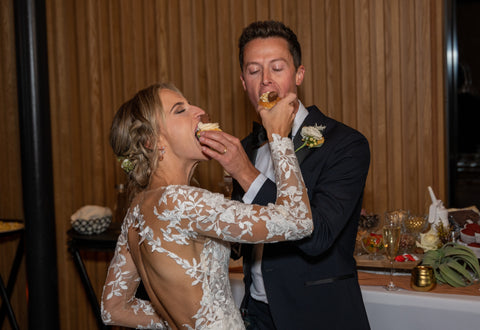 Bride and Groom Eat Custom Wedding Cupcakes Austin Texas