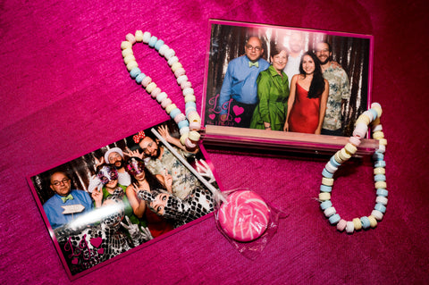 Guests captured memories at the photo booth at pink sparkly mitzvah in Austin, Texas