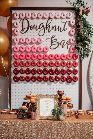 Doughnut wall makes a statement and serves up delicious doughnuts for your wedding dessert