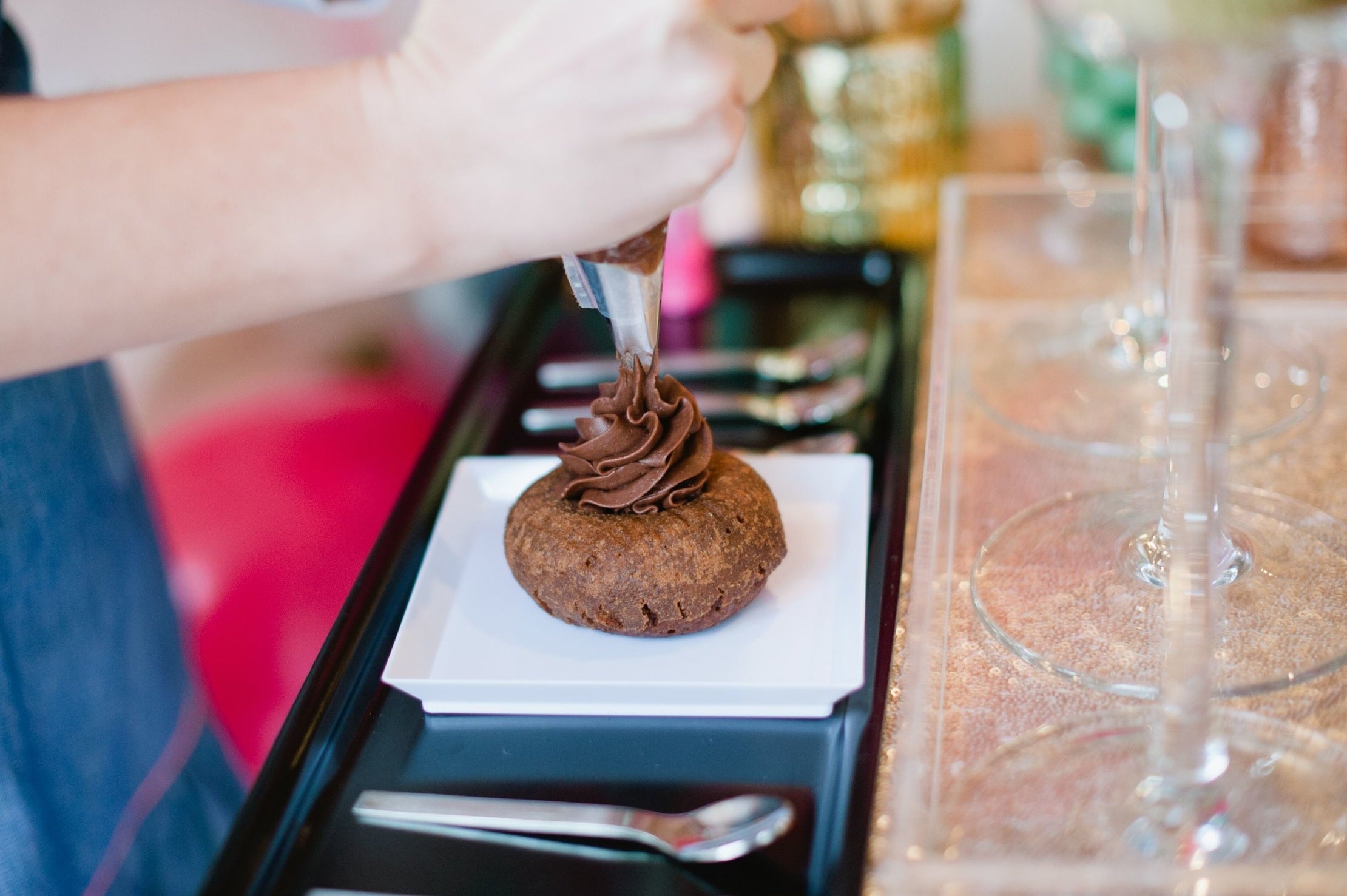 Customize your own edible masterpiece at our Doughnut Bar