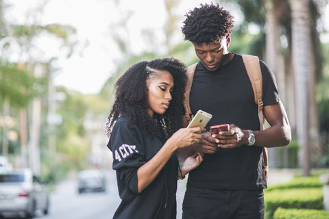 black excellence, male and female on cell phone, ebony notes app