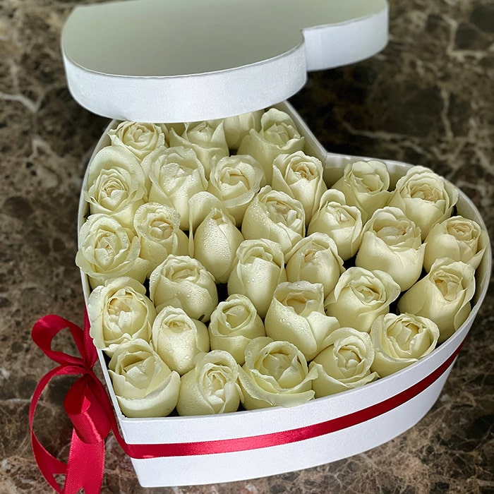 White Roses in a White Heart Box