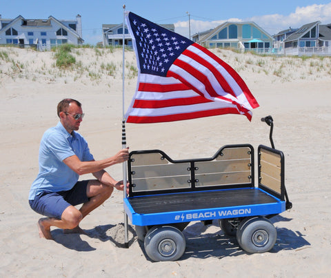 e-Beach Wagon has built-in holders for your beach umbrella