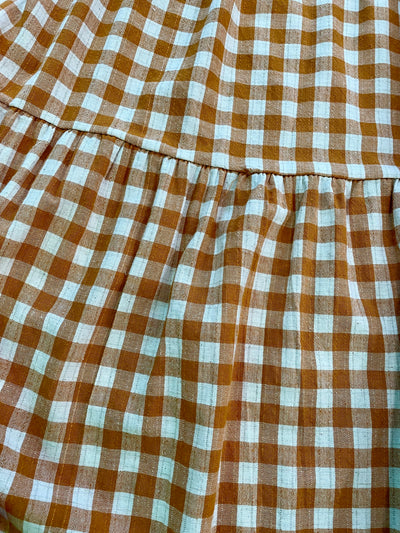 Orange and cream gingham spaghetti strap dress that hits at the knee for curvy sizes. Plus size orange casual dress.