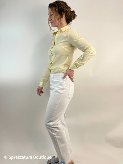 Buttercup yellow women's button down shirt. Long sleeve button up blouse in soft pastel pale yellow collared. 