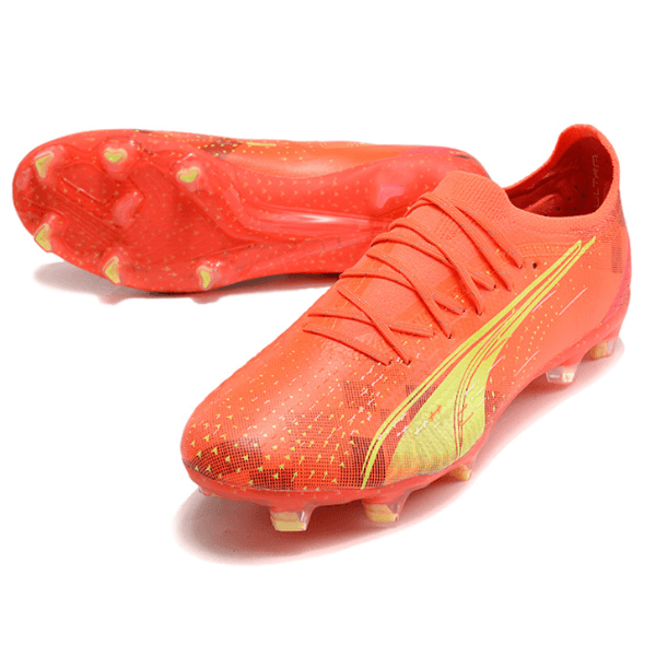 black and orange puma cleats