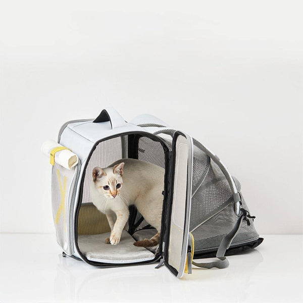 https://cdn.shopify.com/s/files/1/0557/6936/6711/products/petkit-expandable-cat-backpack-missymomo-8_600x600.jpg?v=1681296714