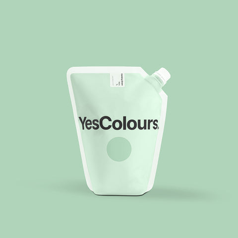 photo of a pouch with logo 'yescolours' photographed on a plain green background