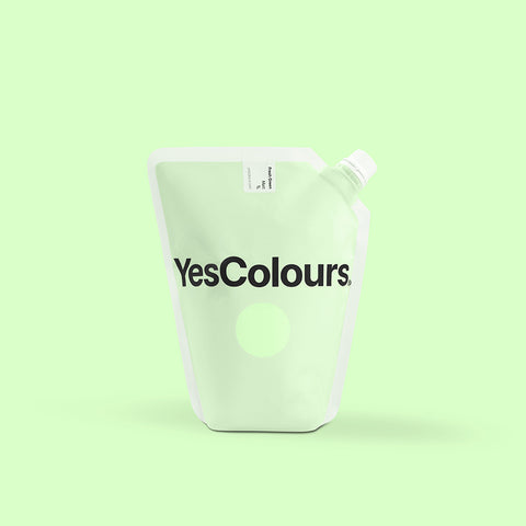 photo of a pouch with logo 'yescolours' photographed on a plain green background