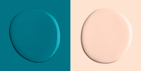 design of two paint colour blobs in the shapes of imperfect circles, a dark teal colour on the right and a pale peachy pink colour on the left