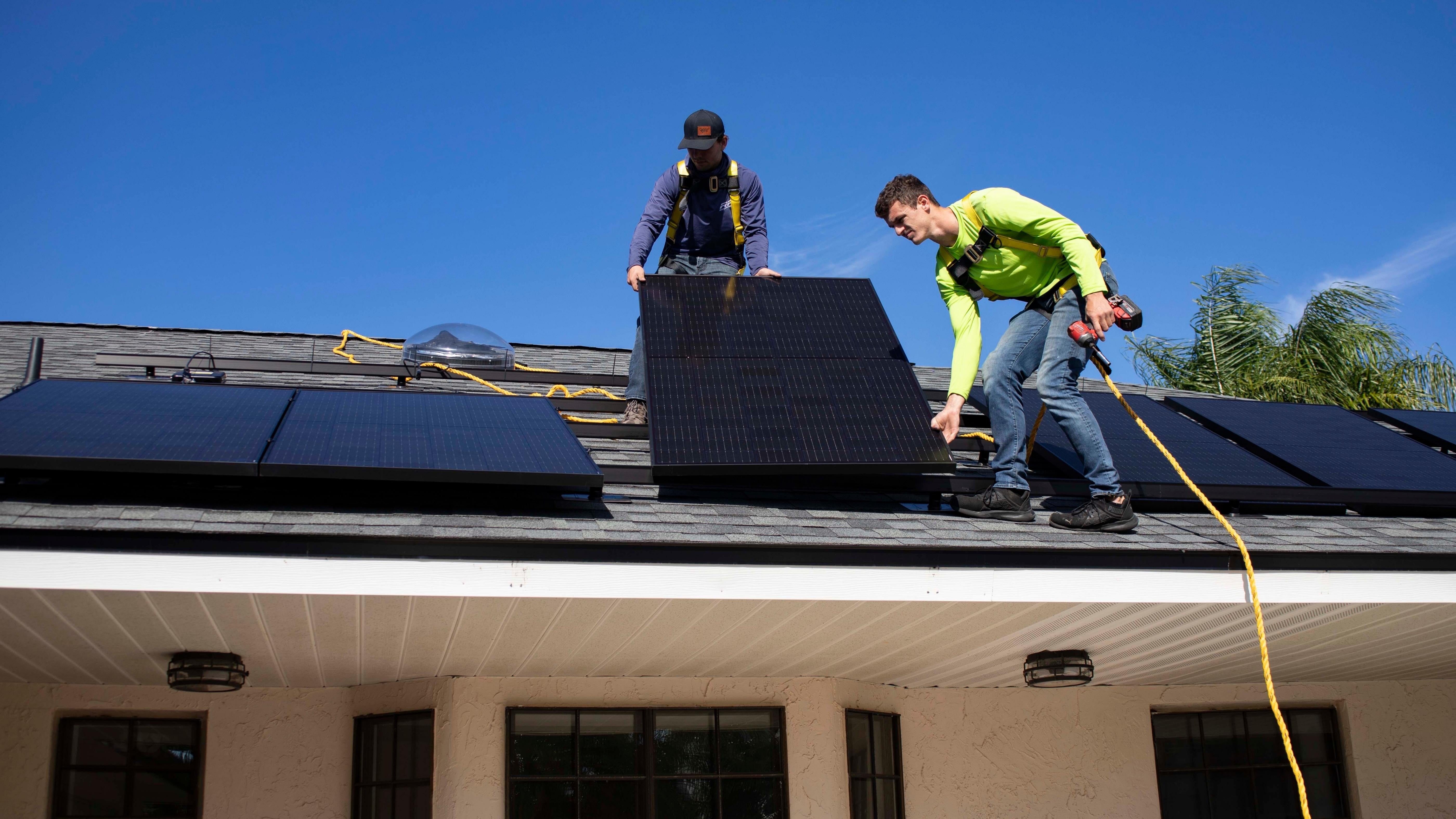 men install solar panels and home battery backup system on UK home