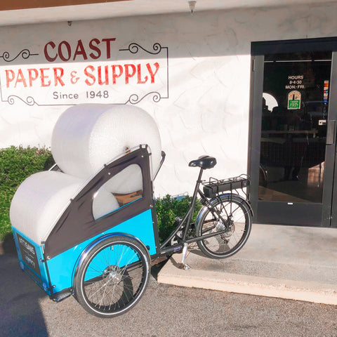 blue Cargo bike transporting bubble wrap