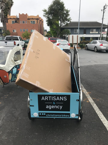 Artisans Cargo bike carrying furniture