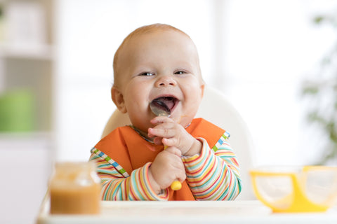 Happy baby about to eat