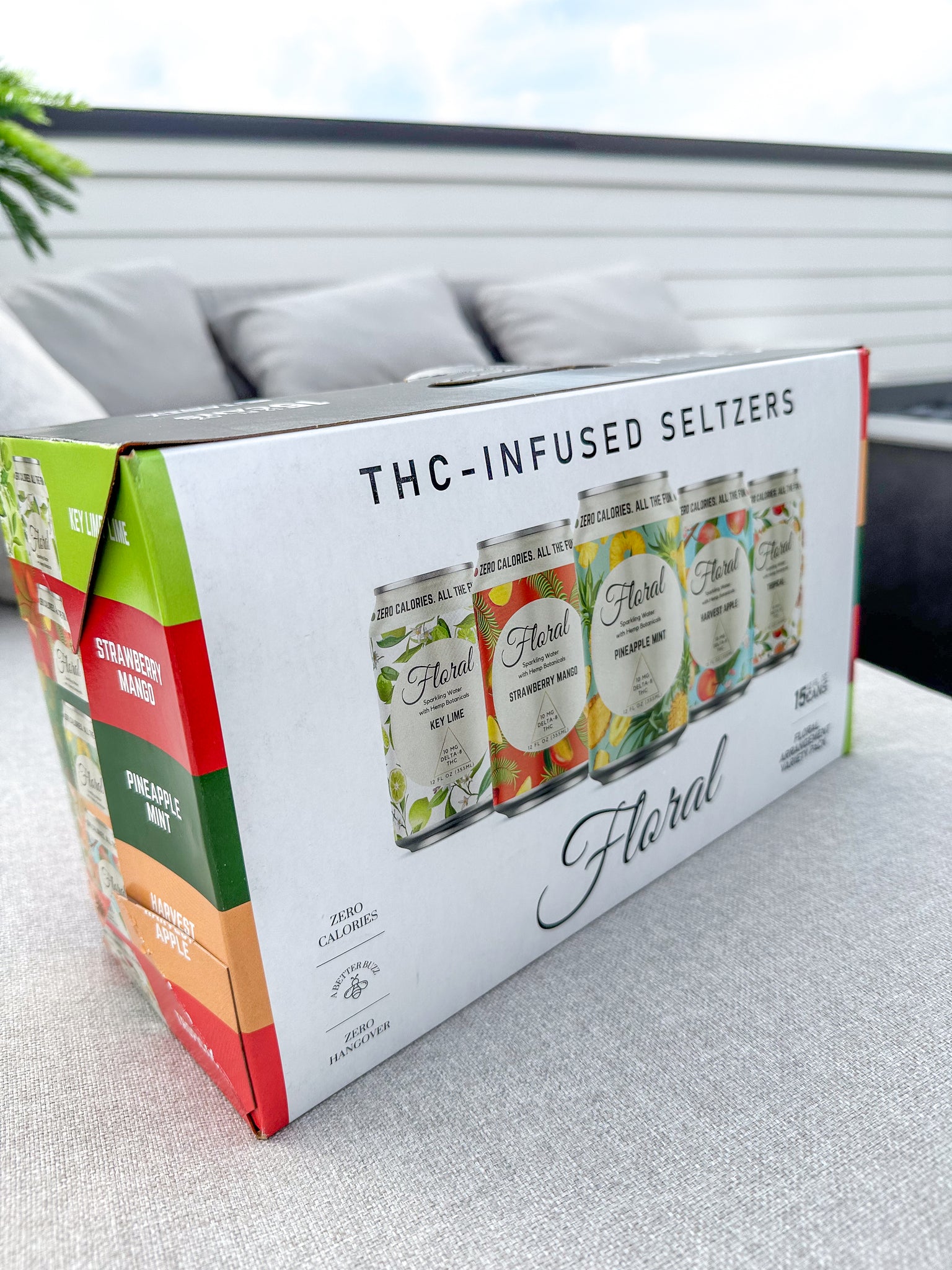 The cardboard box of Floral Beverages Floral Arrangement, an assortment of THC-infused seltzer flavors