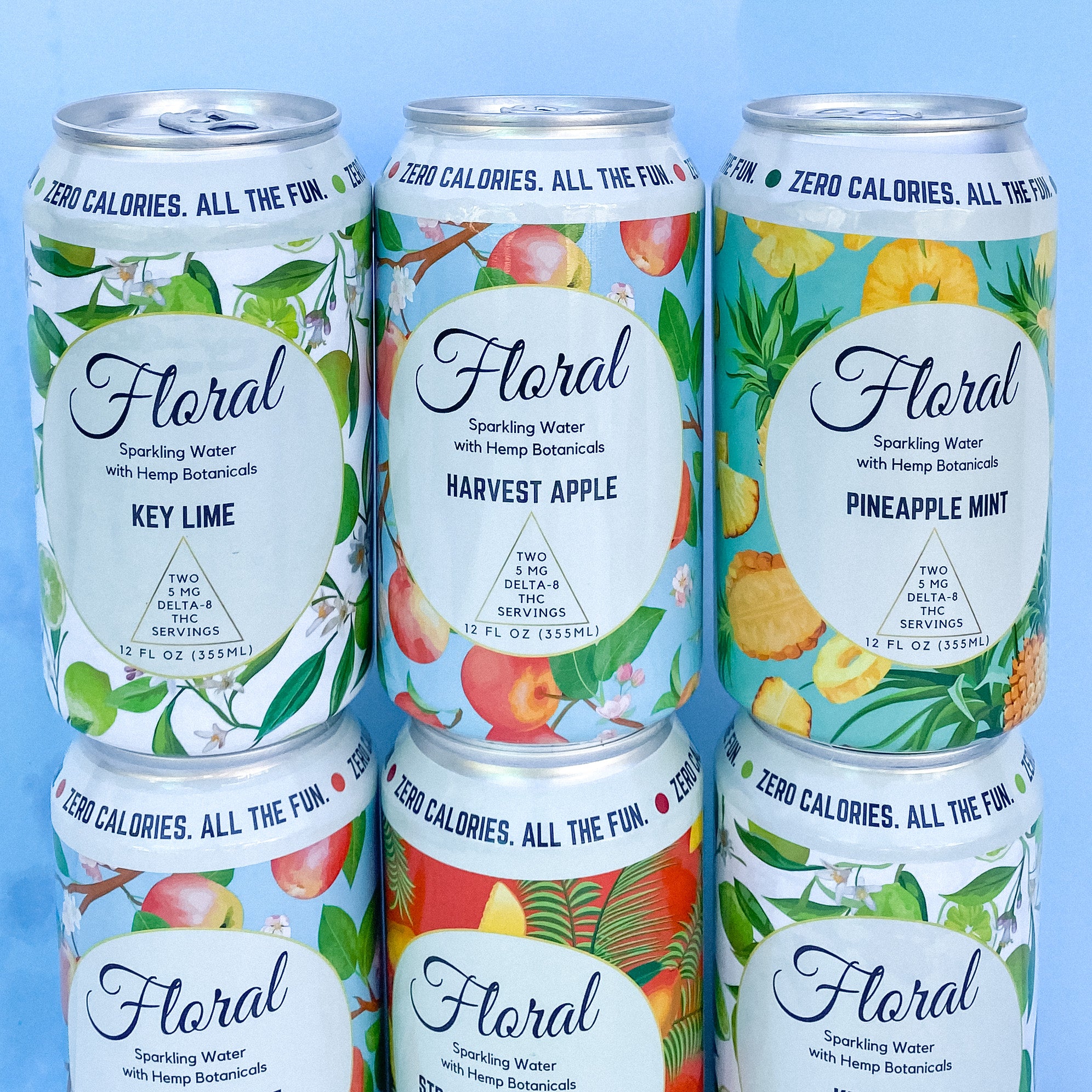 Floral Beverage's THC-infused sparkling water cans stacked on top of each other.