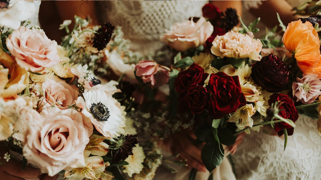 Two brides are better than 1 red and orange fall floral blooms pink and autumn colors